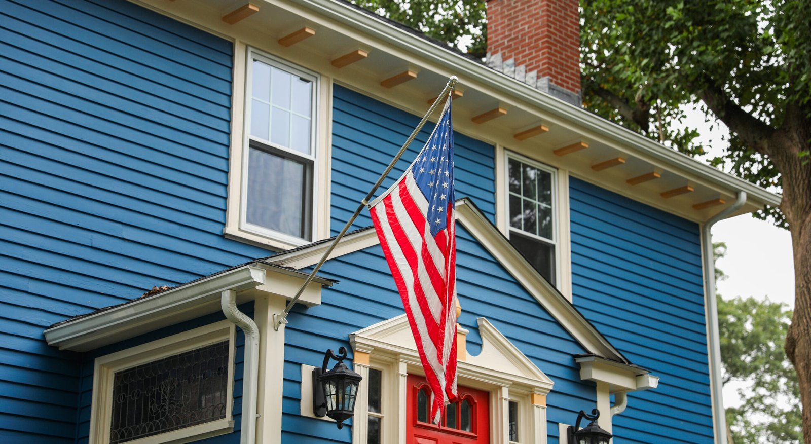 vibrant-us-flag-waves-against-clear-sky-evoking-american-pride-sunny-day-symbolizes-patriot